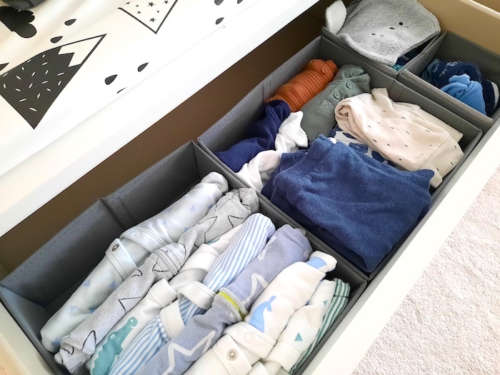 Here are some great ways to organise baby clothes so you can maximise the space you have, as well as some nursery drawer organisation tips to ensure that you organise your nursery drawers in a way that is practical and accessible.