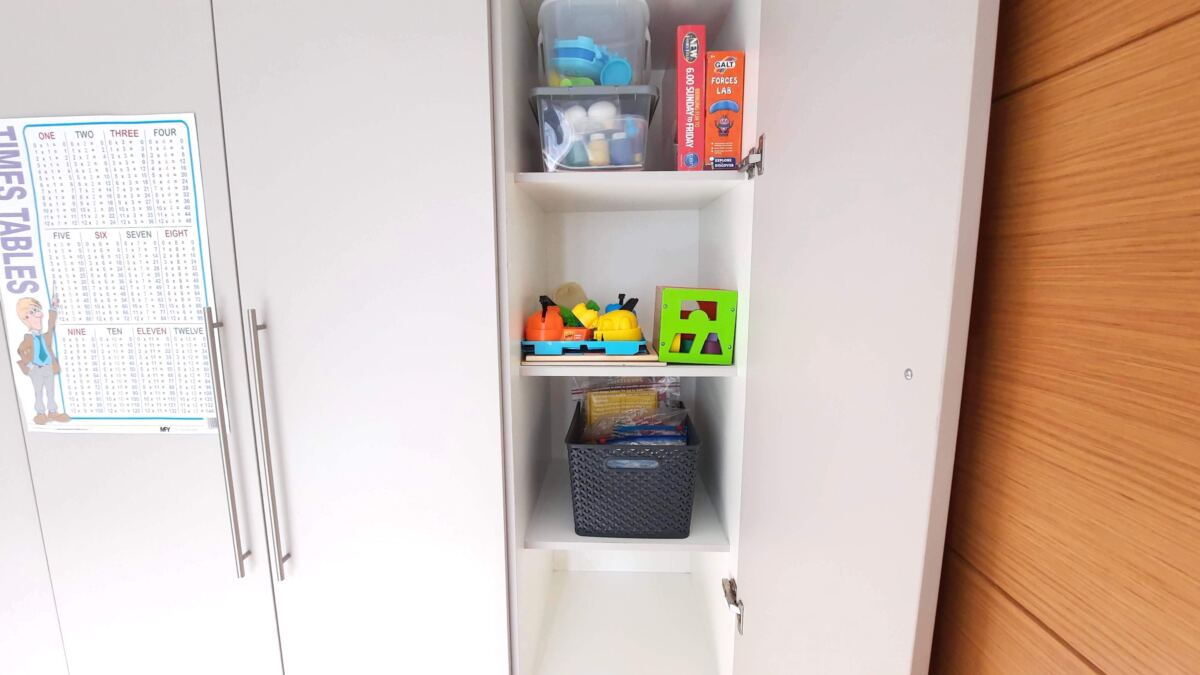 A kid's wardrobe reorganisation project toy storage after