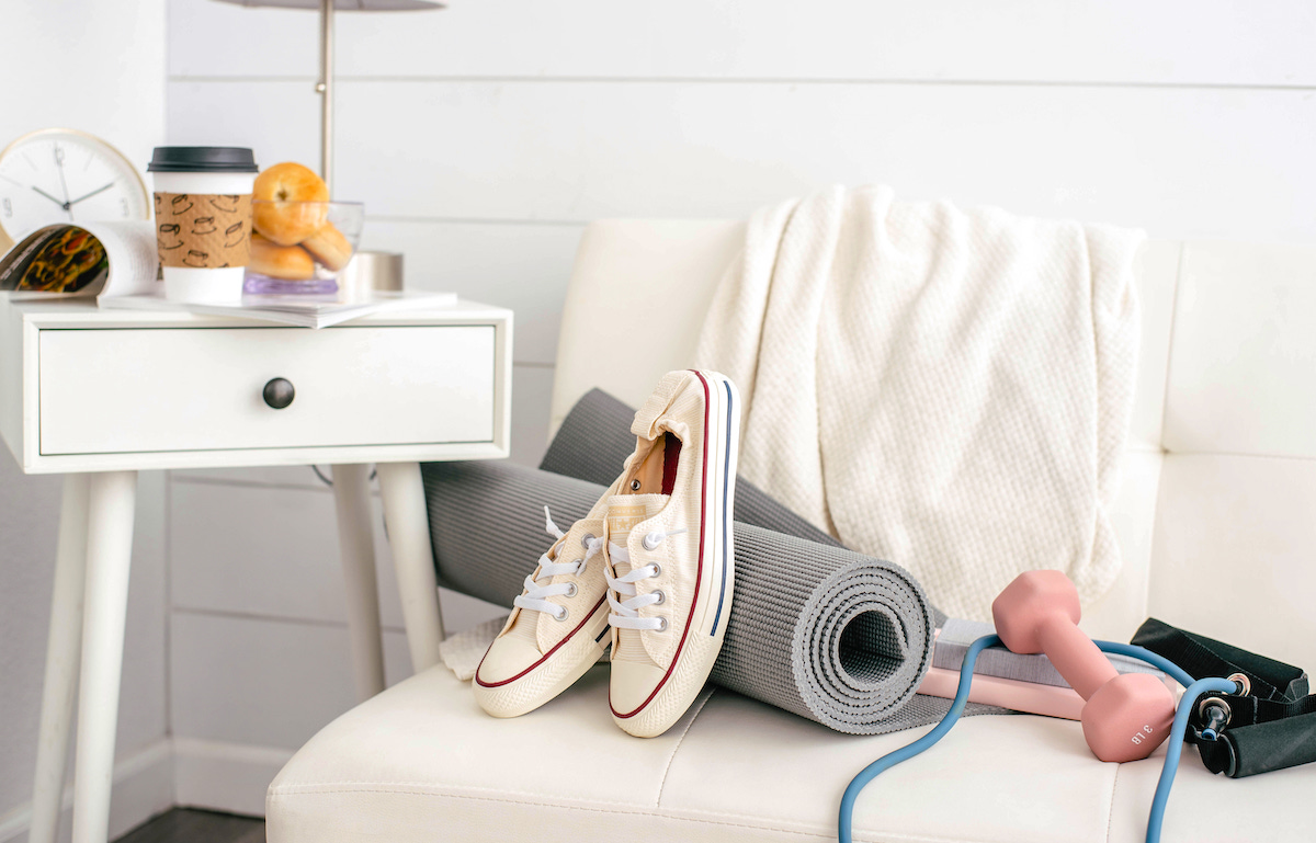 How to find time to exercise as a busy mum yoga mat and shoes on sofa