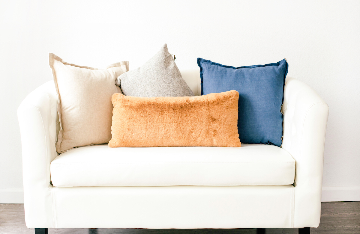 How to increase natural light In your home sofa with 4 cushions