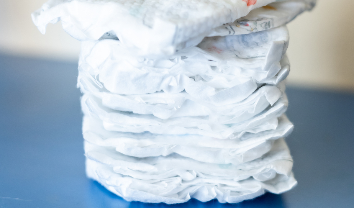 10 tips for potty training at night - pile of nappies.