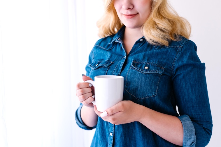 woman holding a coffee cup - one of the things you can do in 20 minutes.