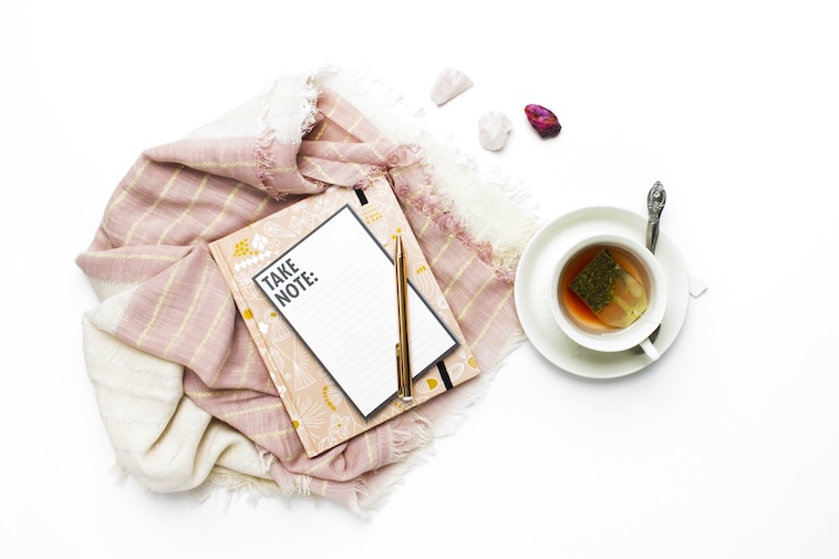 A teapot, scarves, tea, and notebooks - a way to collect ideas to overcome mum burnout.