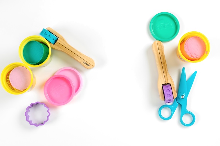 Play-Doh, accessories, and scissors - things you can use at home to prepare for the first day of school.