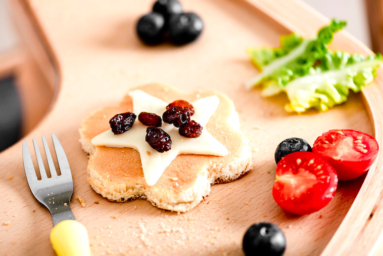 A pancake decorated with a cheese star - just one of the many perfect dinner ideas for fussy toddlers.
