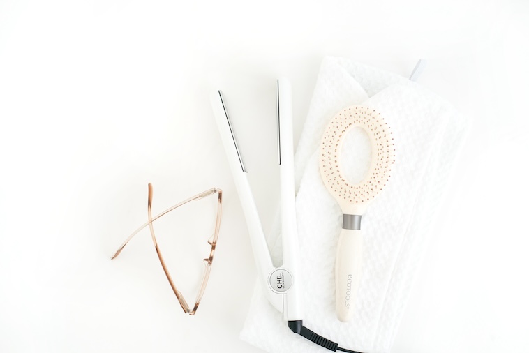 Glasses, hair straightener, brush - things you need when looking for personal care tips.